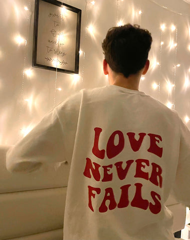 Love never fails | sweatshirt - Apparel for God LLC